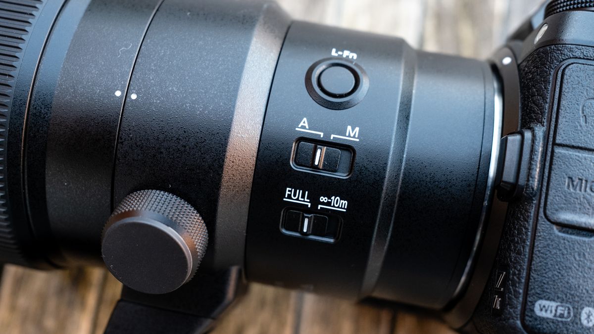 Nikkor Z 600mm f/6.3 VR S attached to a Nikon Z 7II on a frosty wooden table