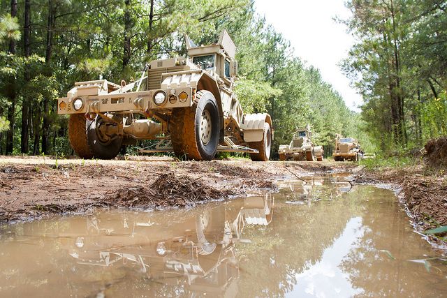 Army national guard searching for explosive devices.