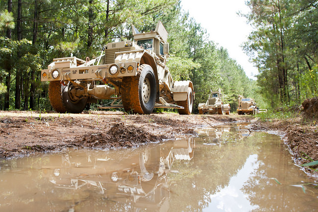 Army national guard searching for explosive devices.