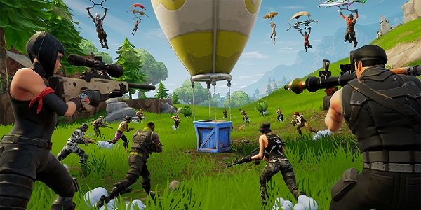 Players rush a loot drop in Fortnite.