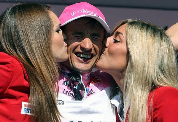 Serguei Gonchar (T-Mobile) still grinning as he is congratulated by the podium girls.