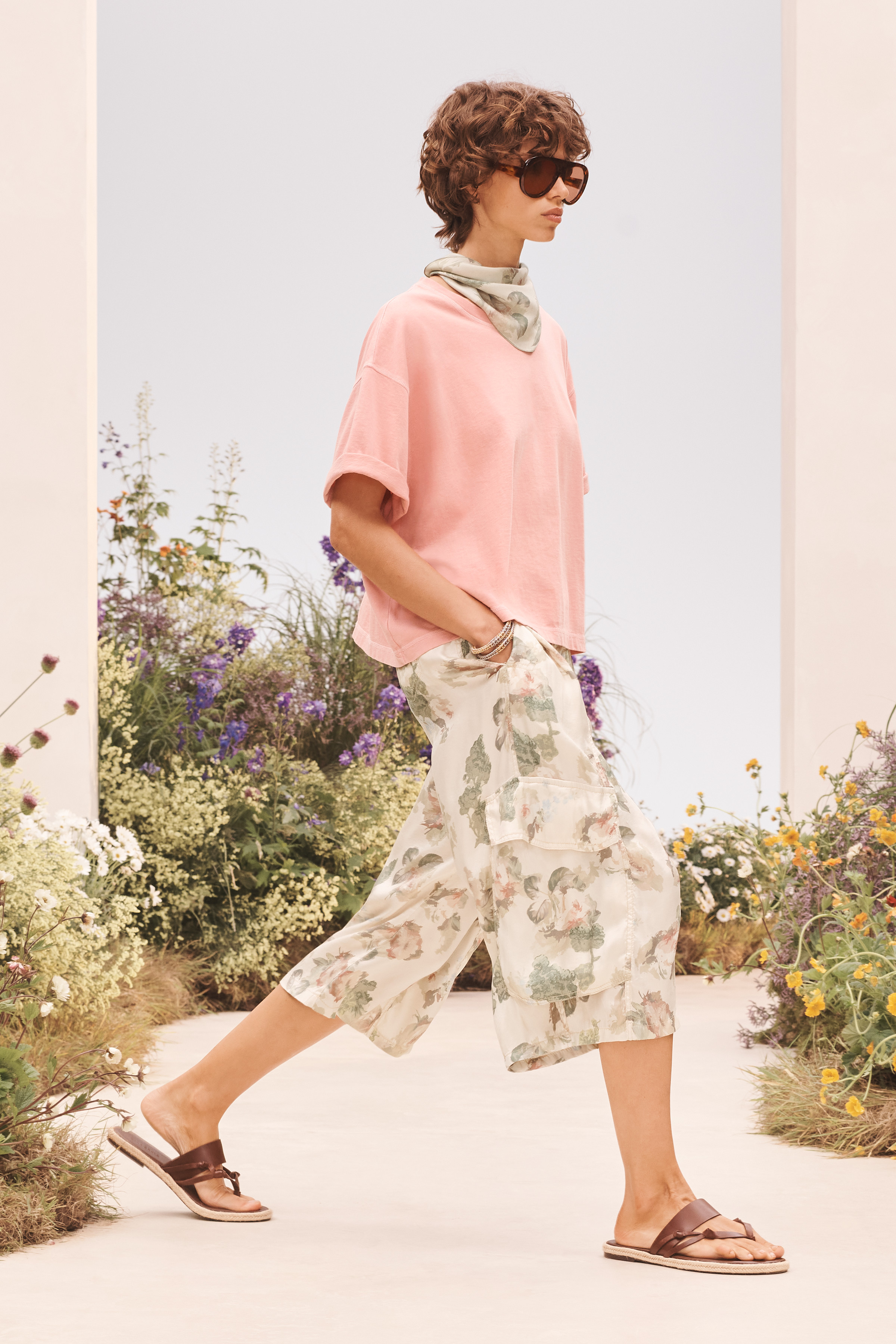 A model wearing a summer outfit from the Zara SRPLS FLWRS fashion collection
