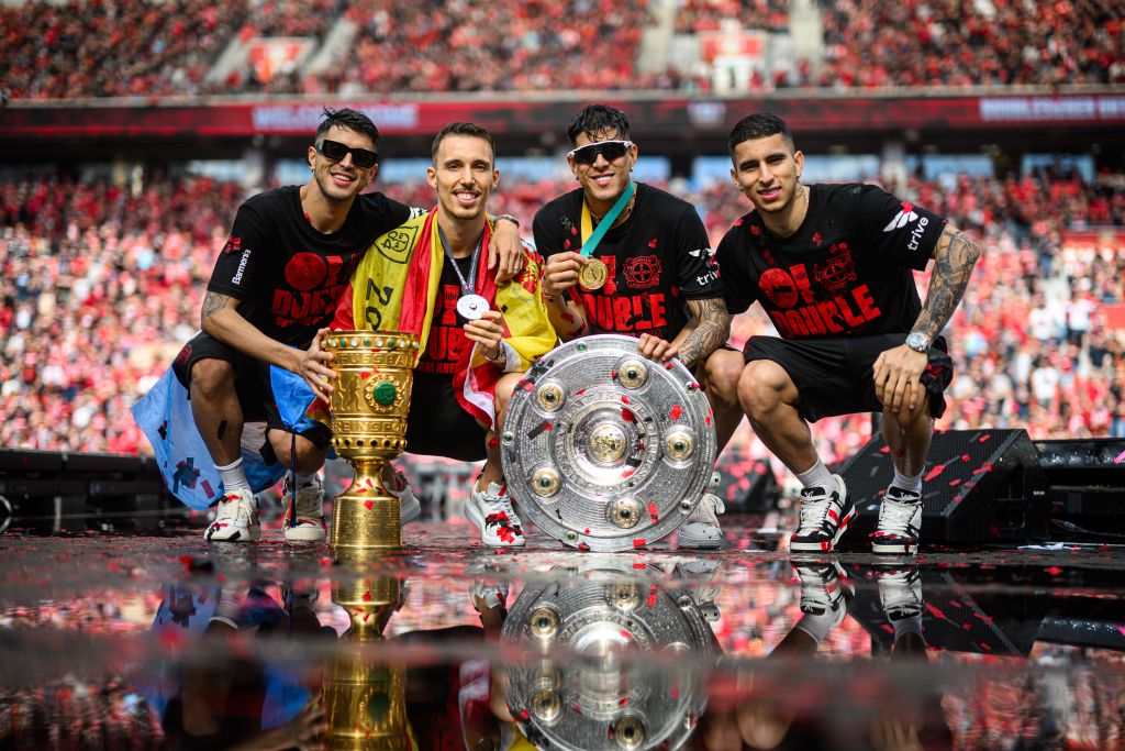 Bayer Leverkusen players celebrate a phenomenal season