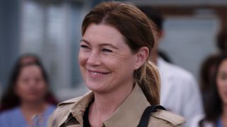Ellen Pompeo smiling as Meredith Grey in her final episode of Grey's Anatomy
