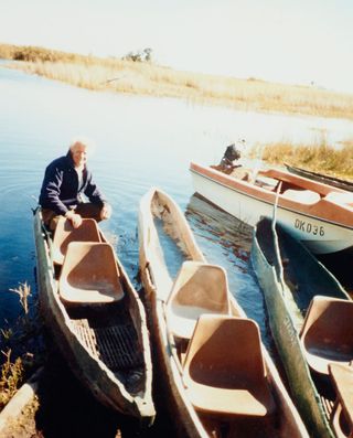 Day in a canoe fitted with his 'Polypropylene Chair' shells, Botswana