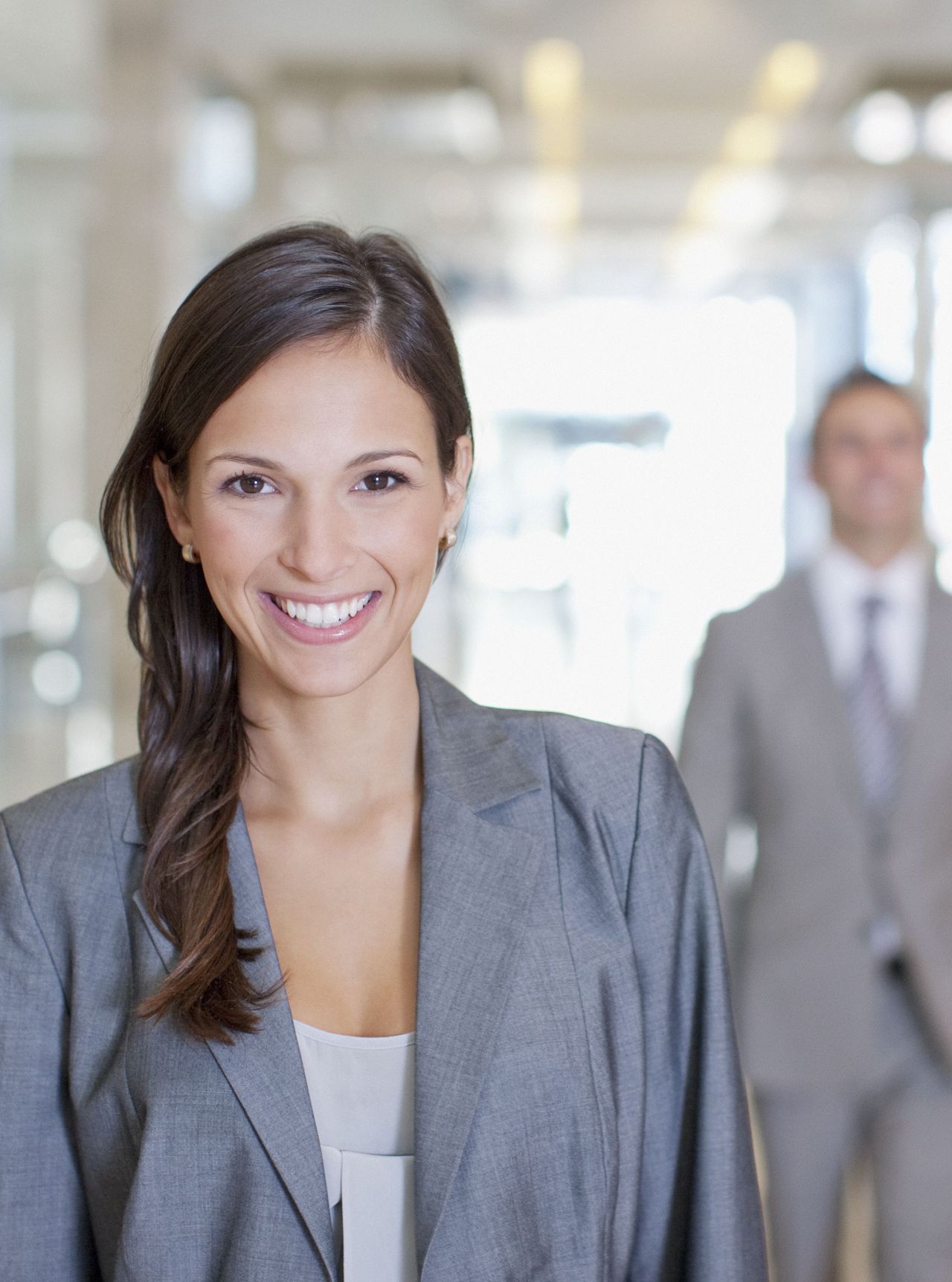 Young woman in suit