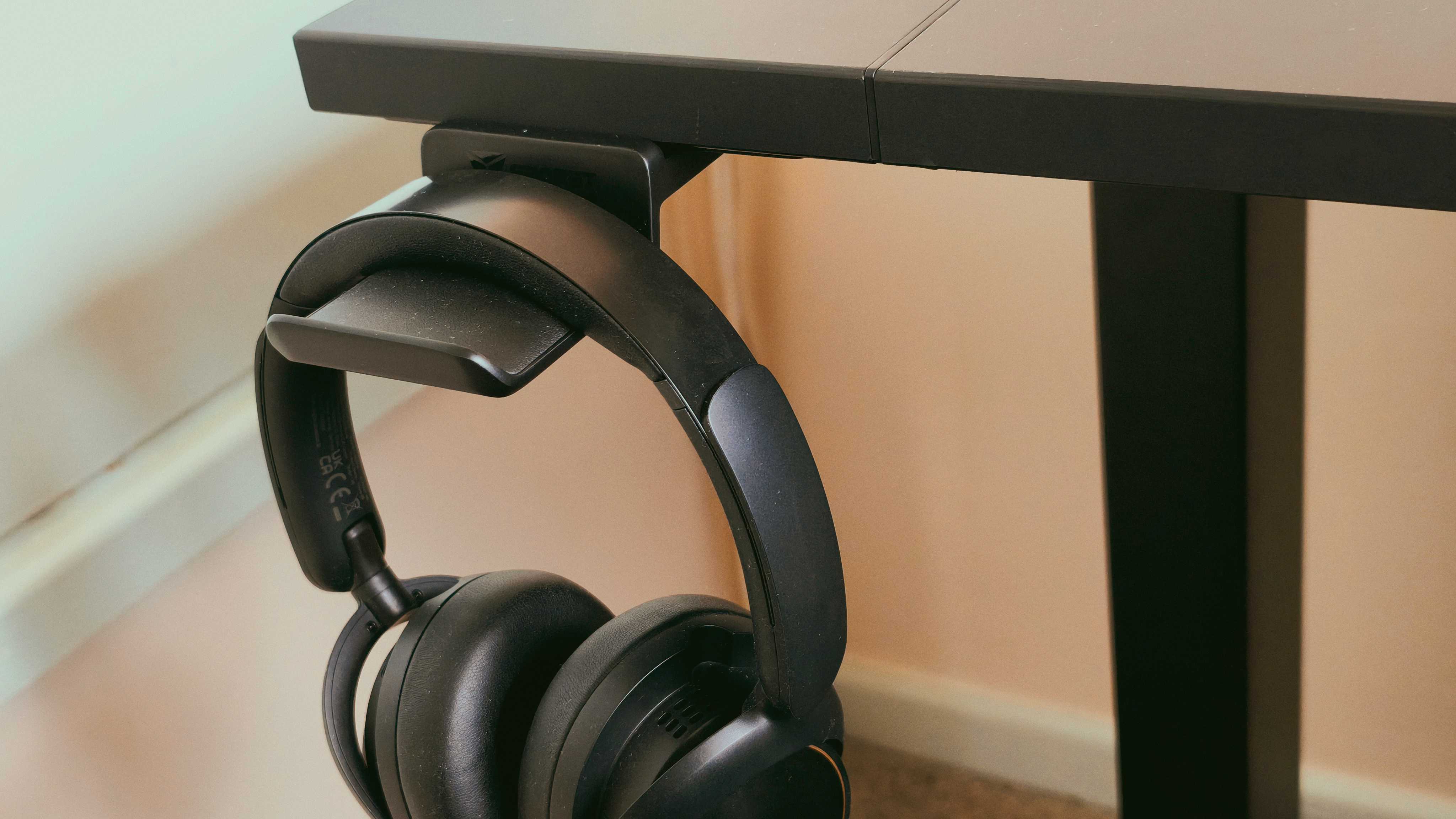A black Secretlab Magnus Evo desk