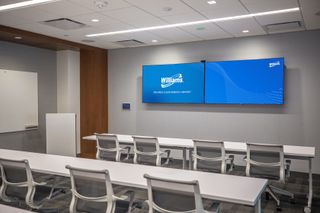 Crestron Flex C-Series custom integrator kits are used in the larger training rooms.