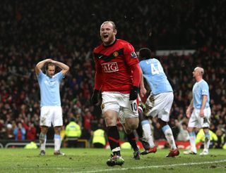 Wayne Rooney celebrates after his late header put Manchester United in front on aggregate in the 2010 semi final.