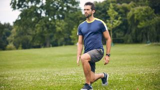 Man doing reverse lunges