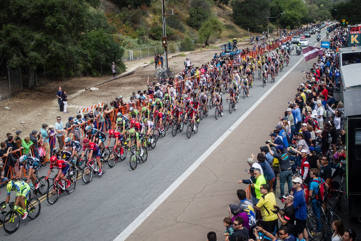 The peloton hits the finish circuits around the Rose Bowl