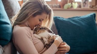 Woman holding rabbit