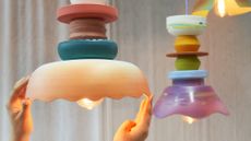 colourful stacked ceramic lamps and bowls