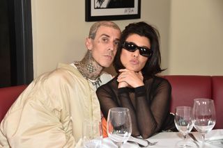 Kourtney Kardashian Barker and Travis Barker at a restaurant