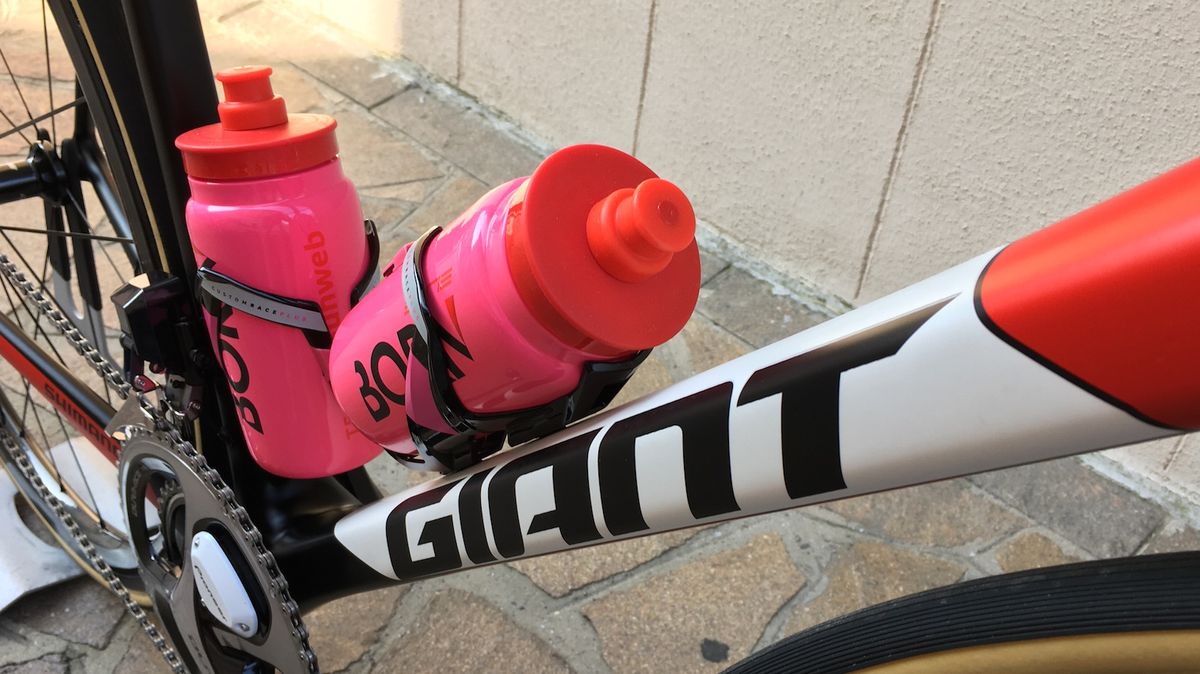 Pink bidons and bottle cages provided by Italian brand Elite