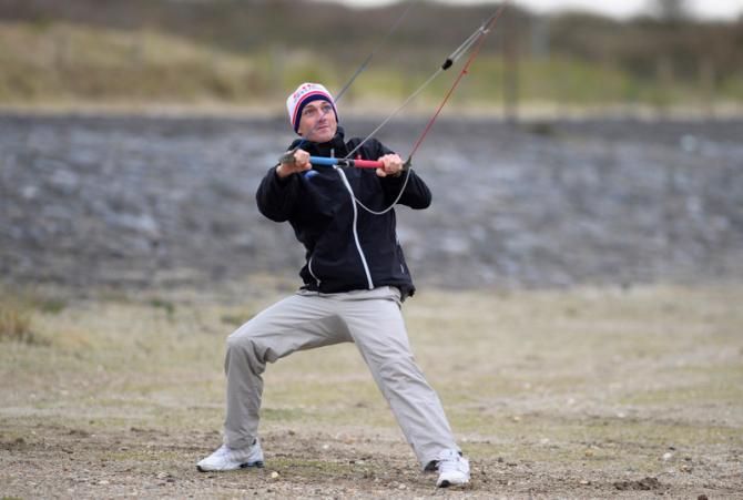 Tour de France contender Jurgen Van den Broeck trying to control his kite