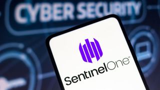 A smartphone with the SentinelOne logo displayed on screen