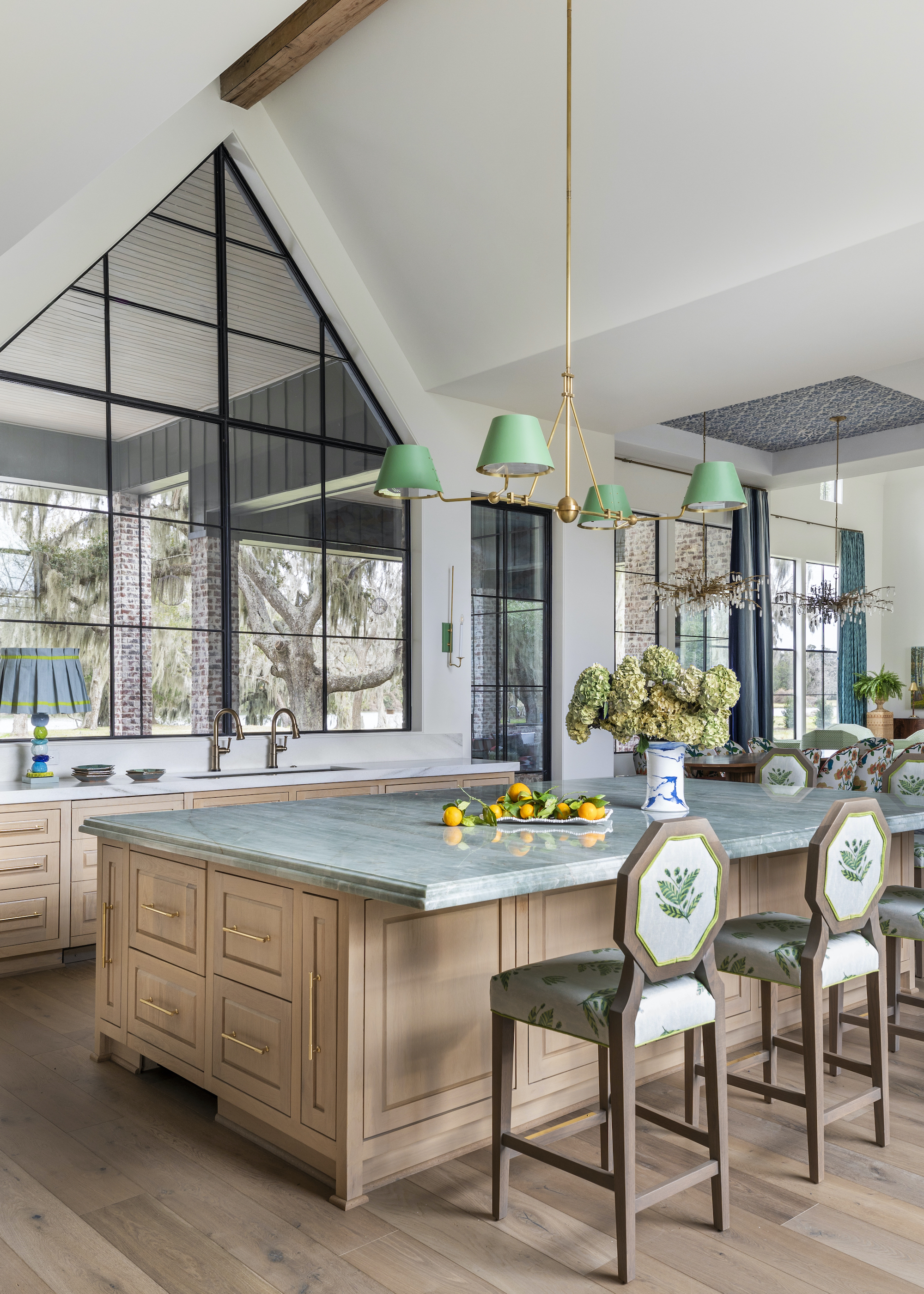 kitchen with wood island and floors and green worktops