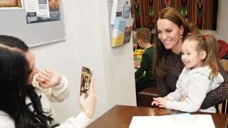 Kate Middleton received a touching gift from a young girl, a painting saying "Kate I Love You"