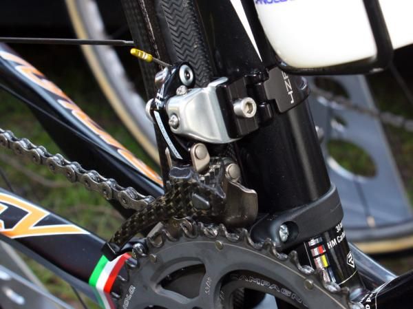A simple plastic chain watcher is on hand on Filippo Pozzato's (Katusha) bike.