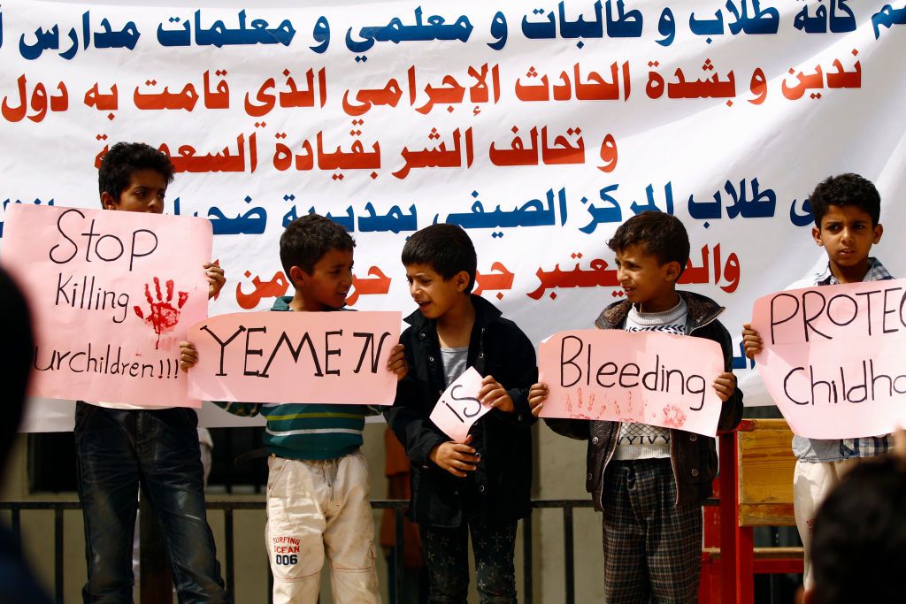 Yemeni children protest a Saudi coalition airstrike that killed dozens of people on a school bus.