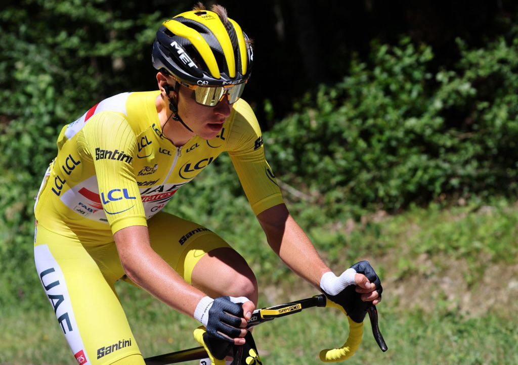 UAE Team Emirates teams Slovenian rider Tadej Pogacar wearing the overall leaders yellow jersey cycles during the 7th stage of the 109th edition of the Tour de France cycling race 1763 km between Tomblaine and La Super Planche des Belles Filles in eastern France on July 8 2022 Photo by Thomas SAMSON AFP Photo by THOMAS SAMSONAFP via Getty Images