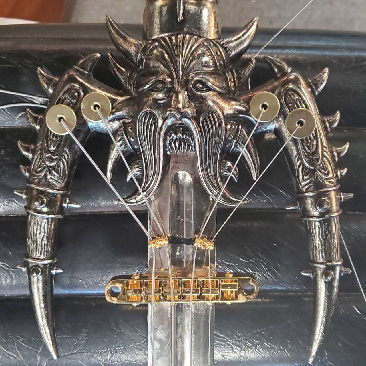 A guitar being built out of a sword