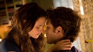 Kristen Stewart and Robert Pattinson as Edward and Bella in Twilight