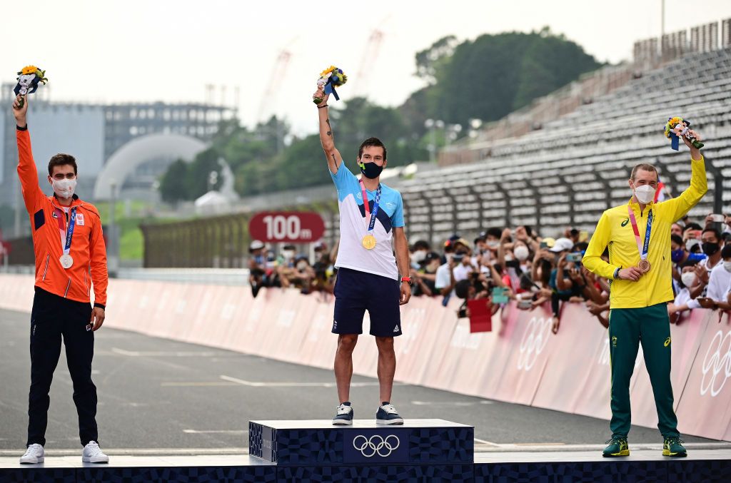 LR Silver medalist Netherlands Tom Dumoulin gold medalist Slovenias Primoz Roglic and bronze medalist Australias Dennis Rohan pose on the podium after the mens cycling road individual time trial during the Tokyo 2020 Olympic Games at the Fuji International Speedway in Oyama Japan on July 28 2021 Photo by Ina FASSBENDER AFP Photo by INA FASSBENDERAFP via Getty Images