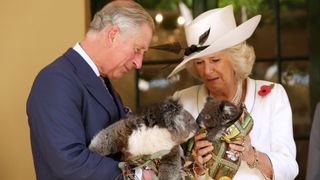 King Charles most memorable moments - Prince Charles and Camilla holding Koalas in Australia
