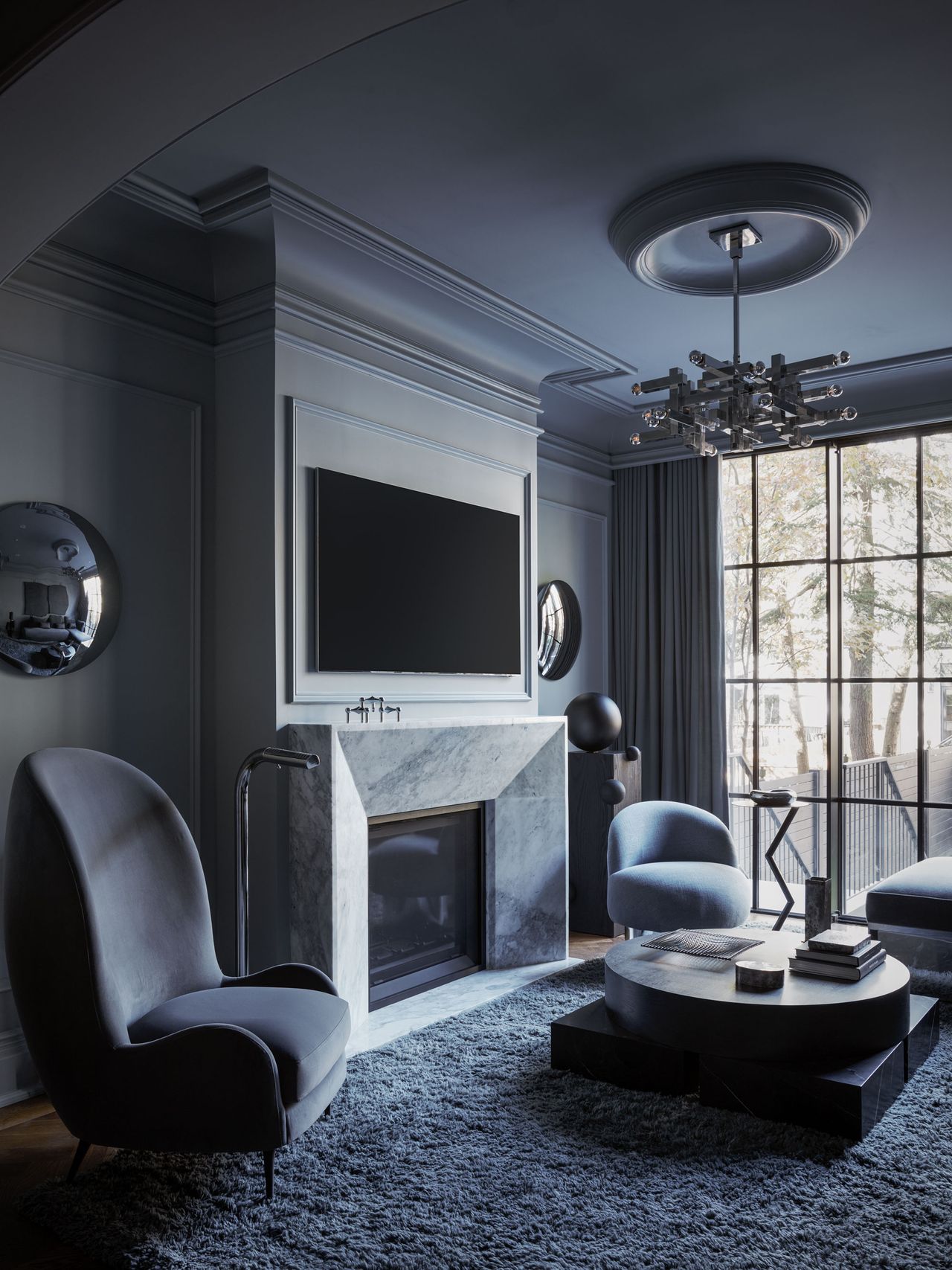 a dark gray monochromatic living room