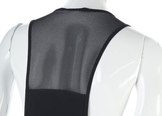 There's a wide mesh section to the upper back and shoulders