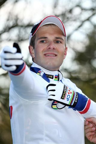 Niels Albert pulls on the World Cup leader's jersey