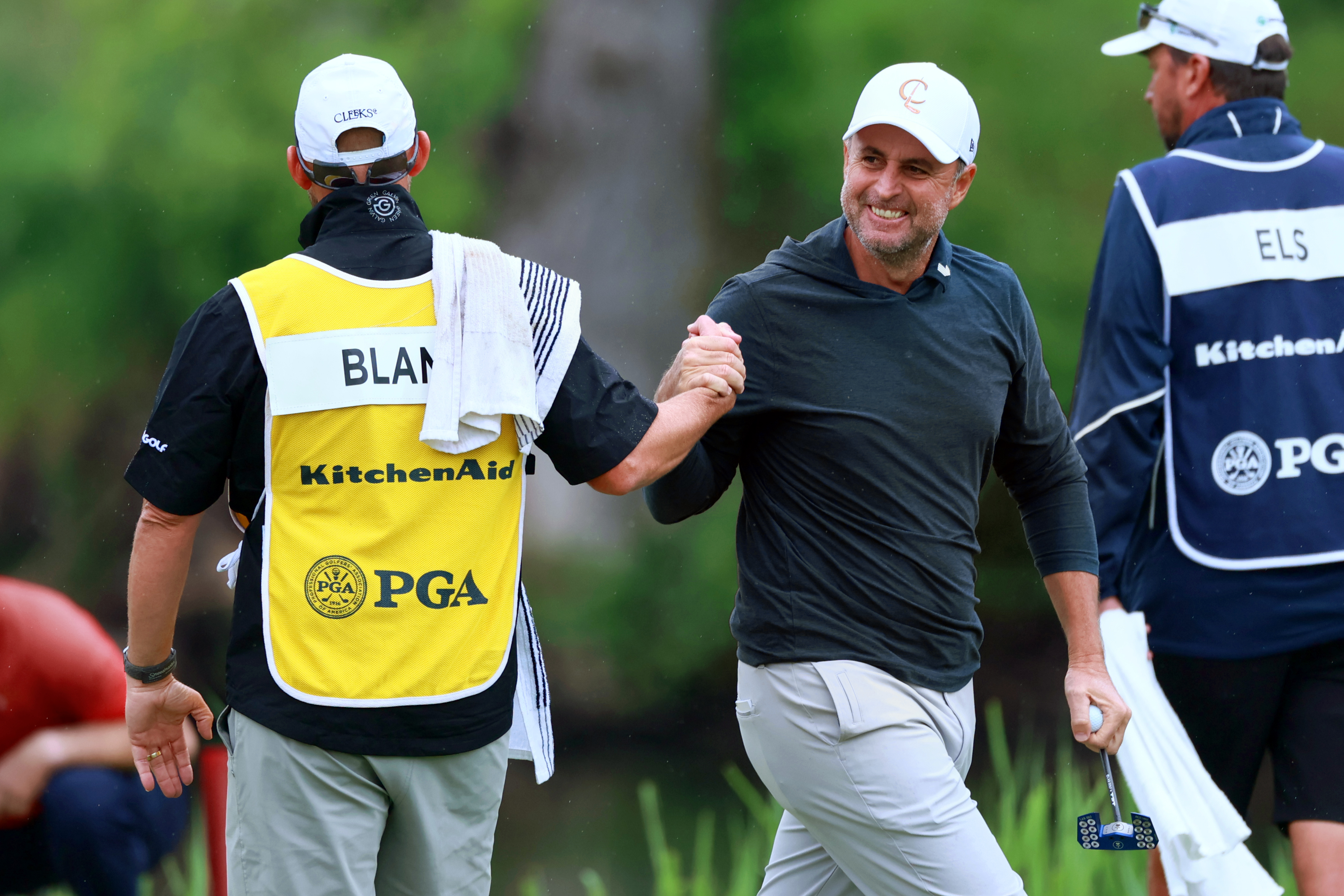 Richard Bland shakes hands with his caddie at the 2024 Senior PGA Championship
