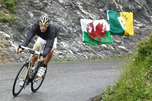 George Hincapie (Team Columbia-HTC) negotiates wet roads in the French Alps.