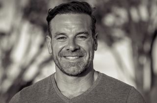 black and white headshot of Bryan Clayton, co-founder of GreenPal