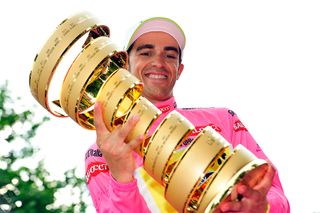 Alberto Contador holds his 2015 Giro trophy.