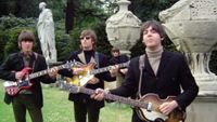 The four Beatles performing in the music video for Paperback Writer