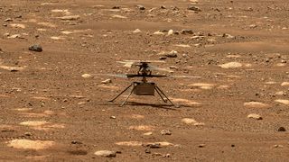 NASA's Mars Helicopter Ingenuity is seen by the Perseverance rover after unlocking its rotor blades on April 7, 2021.