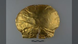 The gold funeral mask was found in the tomb of an ancient noble of the Shang Dynasty. It is thought to be more than 3,000 years old.