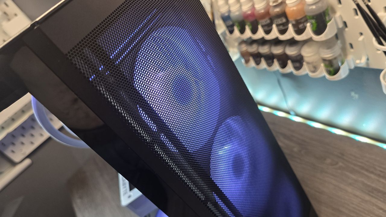The NZXT Kraken Plus 360 RGB liquid cooler installed in a test bench.