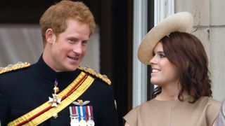 Prince Harry and Princess Eugenie stand on the balcony of Buckingham Palace