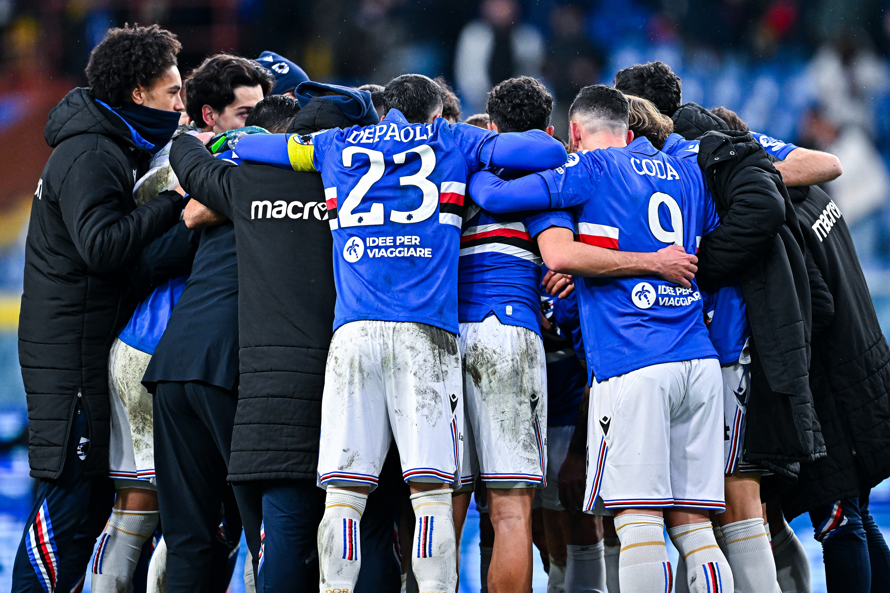 Sampdoria's player in a team huddle