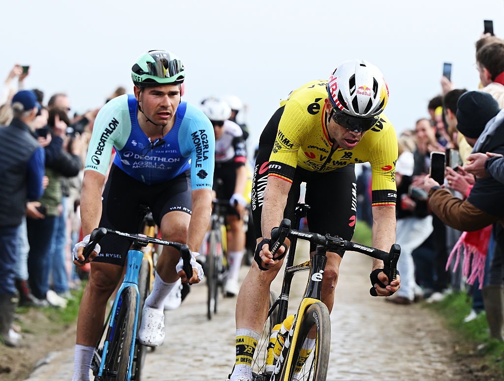 ROUBAIX FRANCE APRIL 13 LR Stefan Bissegger of Switzerland and Team Decathlon AG2R La Mondiale and Wout Van Aert of Belgium and Team Visma Lease a Bike compete during the 122nd Paris Roubaix 2025 a 2592km one day race from Compiegne to Roubaix UCIWT on April 13 2025 in Roubaix France Photo by Dario BelingheriGetty Images