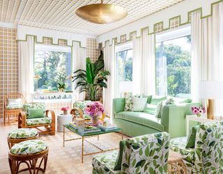 palm beach sunroom with green furniture and trellis prints