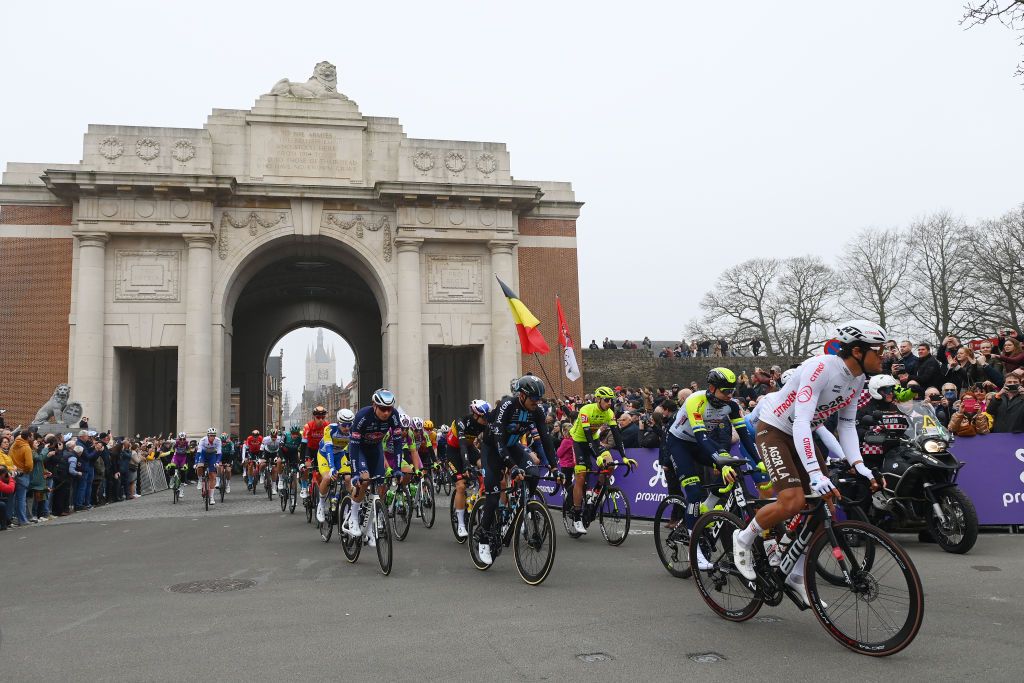 WEVELGEM BELGIUM MARCH 27 Greg Van Avermaet of Belgium and AG2R Citren Team R and the peloton at Menin Gate Menenpoort prior to the 84th GentWevelgem in Flanders Fields 2022 Mens Elite a 2488km one day race from Ypres to Wevelgem GWE22 WorldTour on March 27 2022 in Wevelgem Belgium Photo by Tim de WaeleGetty Images