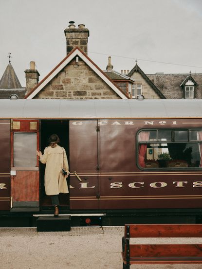 Woman boarding a train