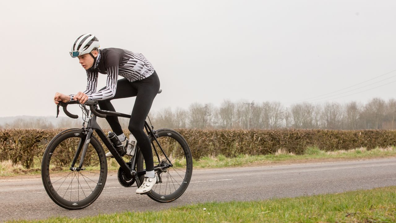 cyclist in aero position in saddle