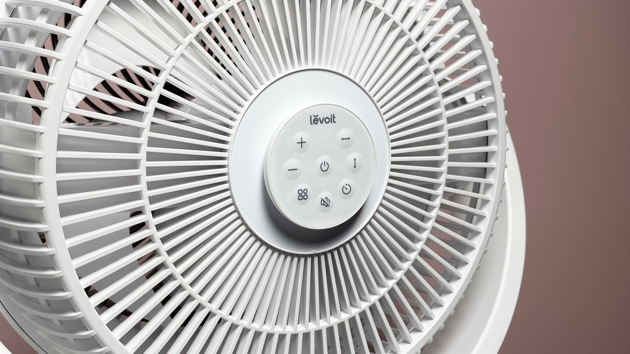 The remote control is magnetically attached to the back of the air circulator.