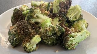 close up of air fryer broccolli